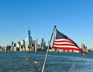 U.S. flag in front of lower Manhattan